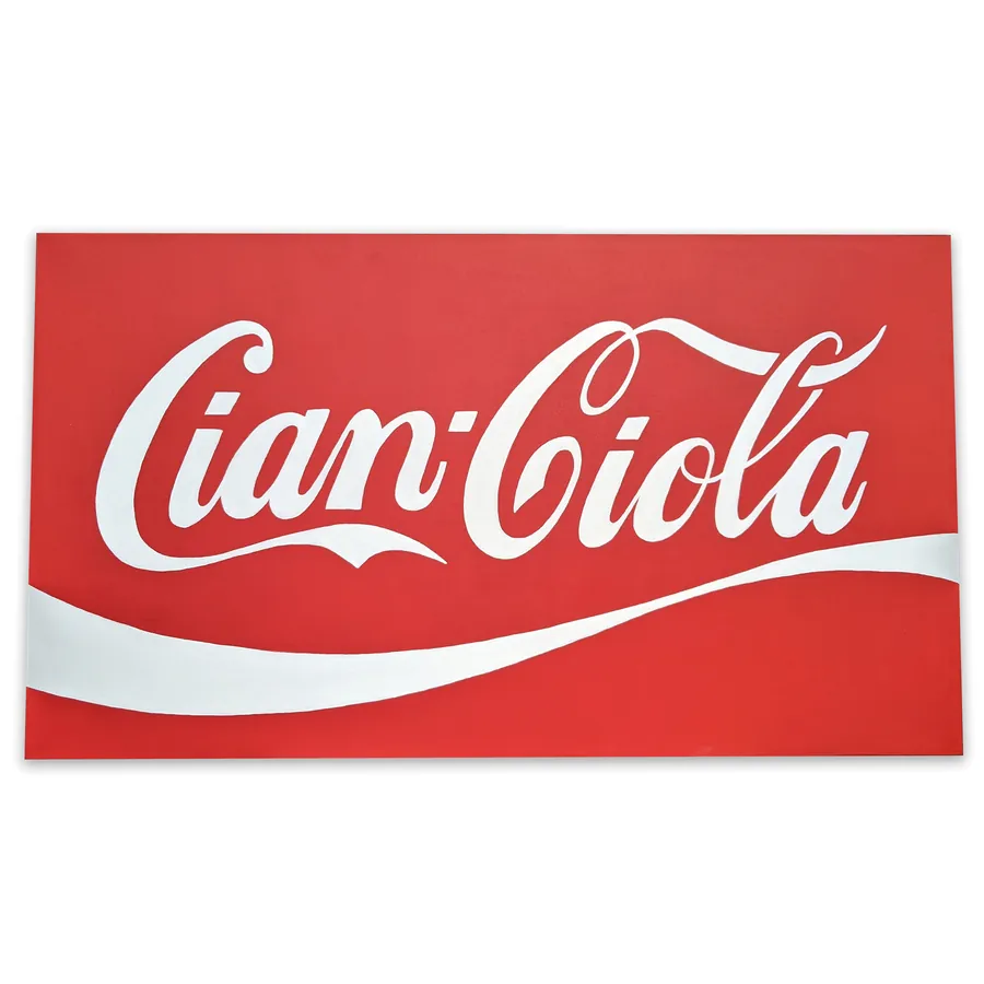 Hand-painted script lettering sign in red and white